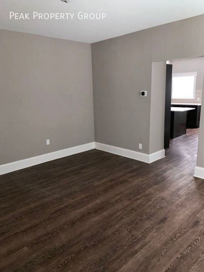 Building Photo - Located in Weinland Park, just minutes fro...