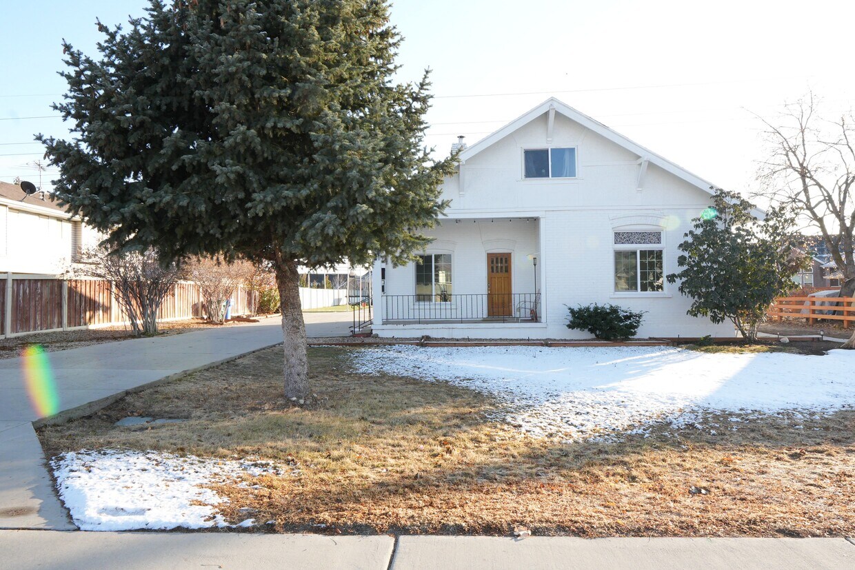 Front of house - apartment's private entrance is located to the right - 163 W 400 S
