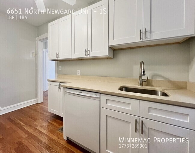 Building Photo - 6651 N Newgard Ave