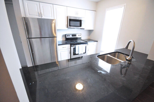 renovated 2 bedroom kitchen - Grandview Passage Apartments