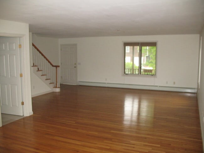 Entrance and open family room - 4A Romano Village Dr