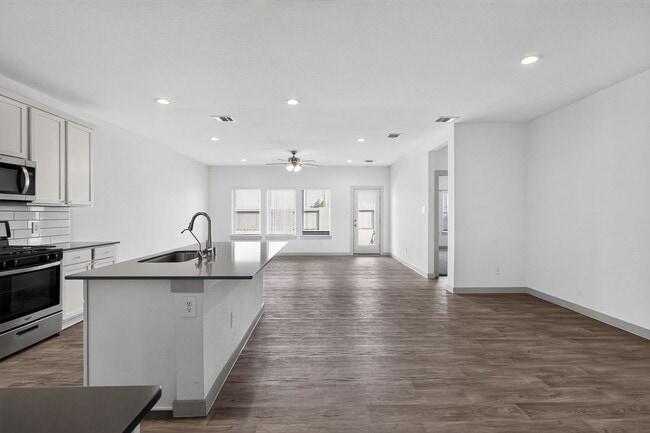Building Photo - Like-New 4-Bedroom Corner Lot Home with Game Room, Appliances Included & Private Backyard