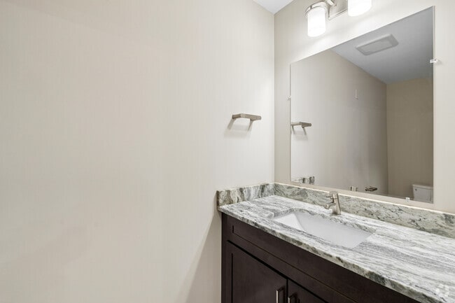 1BR, 1.5BA - 1,184SF - Half Bath - Tumblerock Luxury Apartments