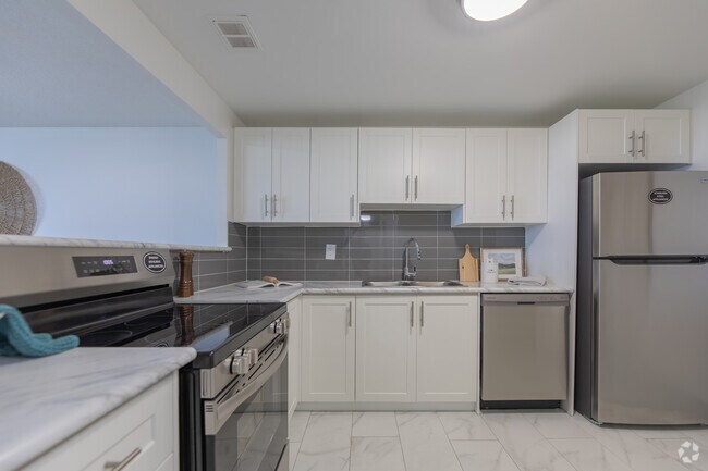 2 chambres, 2 salles de bain - 105 m² - Cuisine - 75 Charolais Boulevard