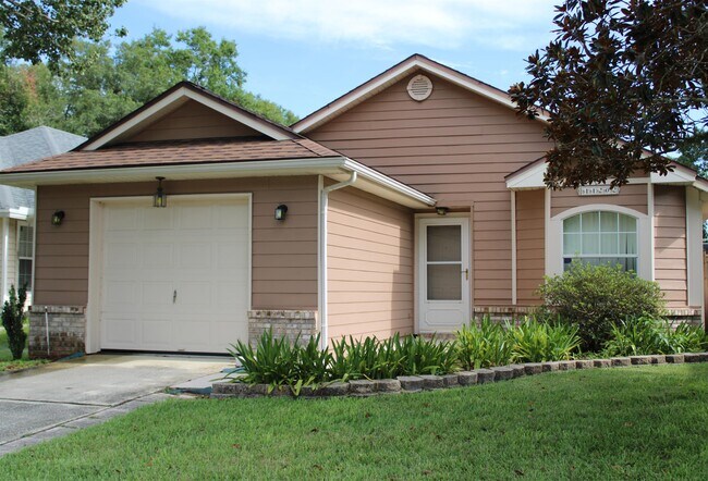 Building Photo - 11202 Mikris Dr N