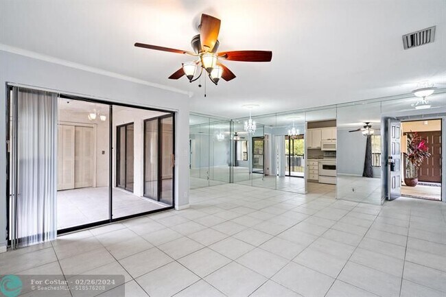 Building Photo - 3463 Cocoplum Cir