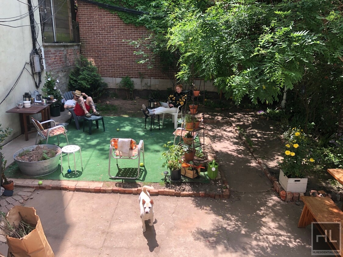 Primary Photo - Wing 2 bedroom with sunny backyard!