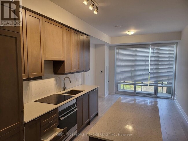 Building Photo - 30-1130 Elm Dr W