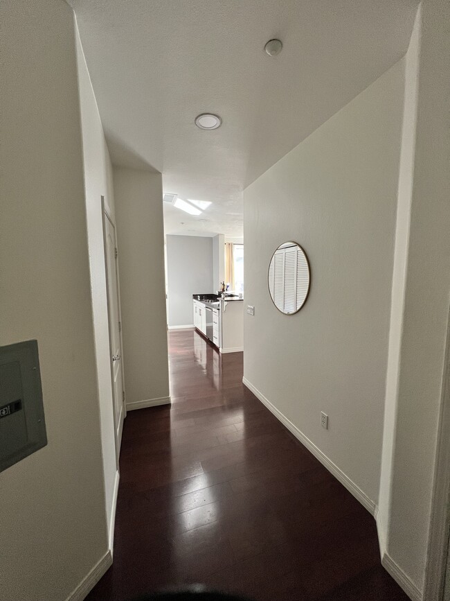 Unit entryway with coat closet and pantry - 3950 Ohio St