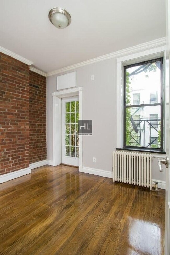 Foto del edificio - Bright Nolita 3-Bedroom with Skyline Views