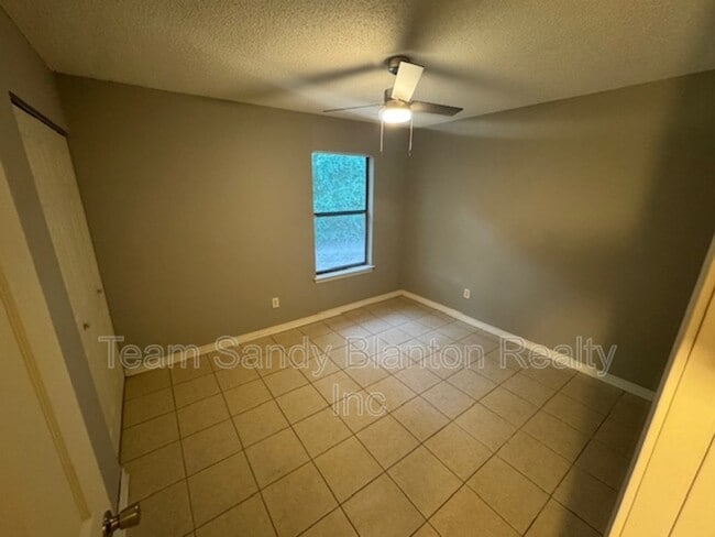 Building Photo - 6823 Tiki Ln