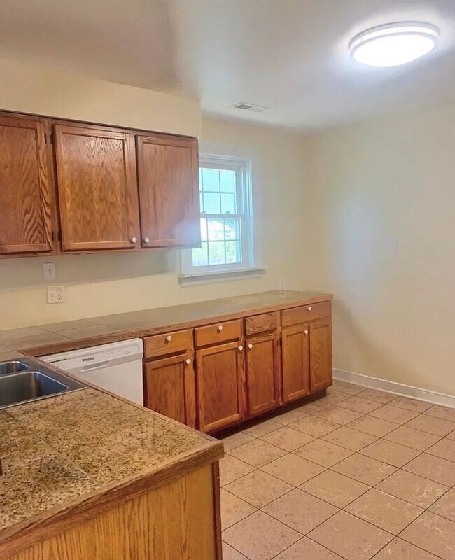 Foto del edificio - Super Cute 3 bed 2 bath Rancher with detached Garage and alley access.