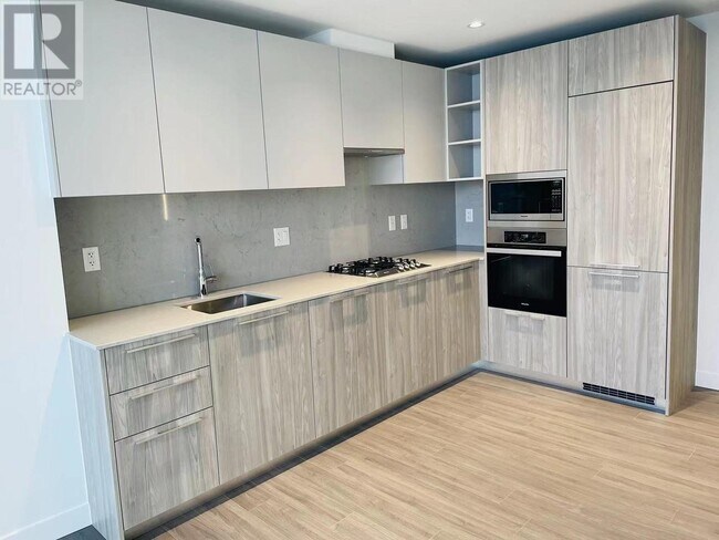 Photo du bâtiment - 6699-6699 Dunblane Ave
