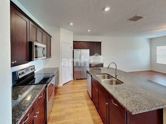 Building Photo - 8116 Golden Bamboo Dr