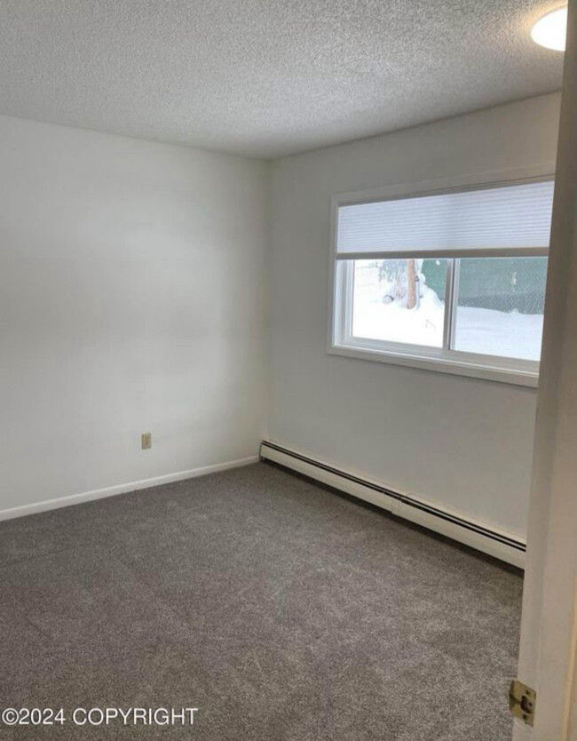 Building Photo - 8530 Kluane Ave