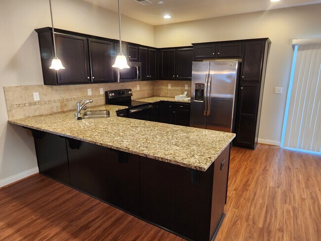 Foto del edificio - Beautiful garden ranch home with an open f...