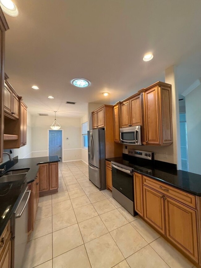 Foto del edificio - Spacious 2+Den Villa in Desirable Gateway Greens