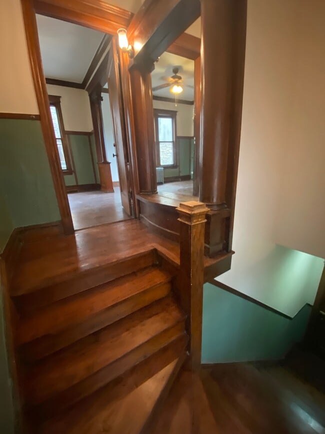 Private Staircase Entry with lighted pier mirror on landing - 6000 S Bishop St