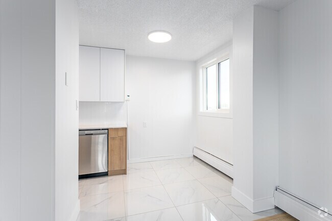 2 chambres, 1 salle de bain - 875 pi² - Salle à manger - Lancaster Tower