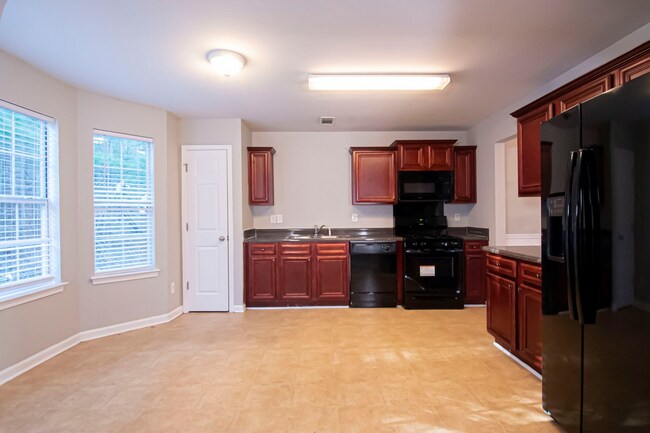 Building Photo - Spacious 4-Bedroom Home with Fireplace, St...