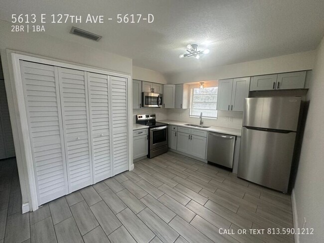 Building Photo - 5613 E 127th Ave