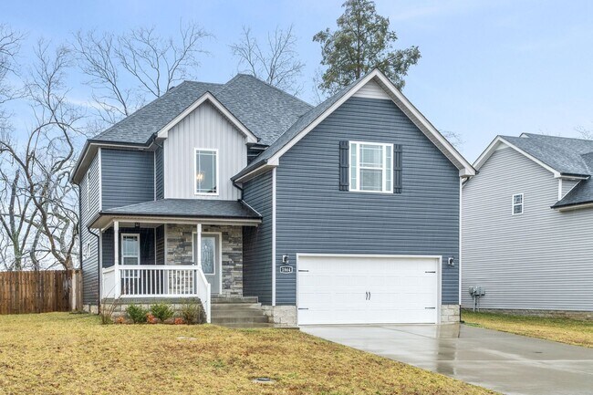 Building Photo - Pet Friendly Three Bedroom with Bonus!