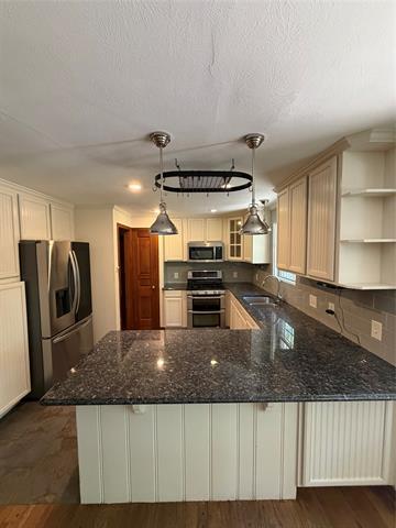 Foto del edificio - 6452 E Lovers Ln