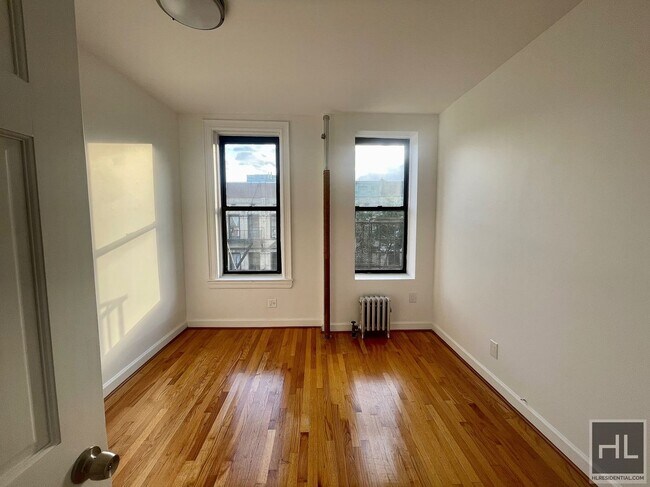 Building Photo - SUNNY 3 BEDROOM ON EAST 7 STREET