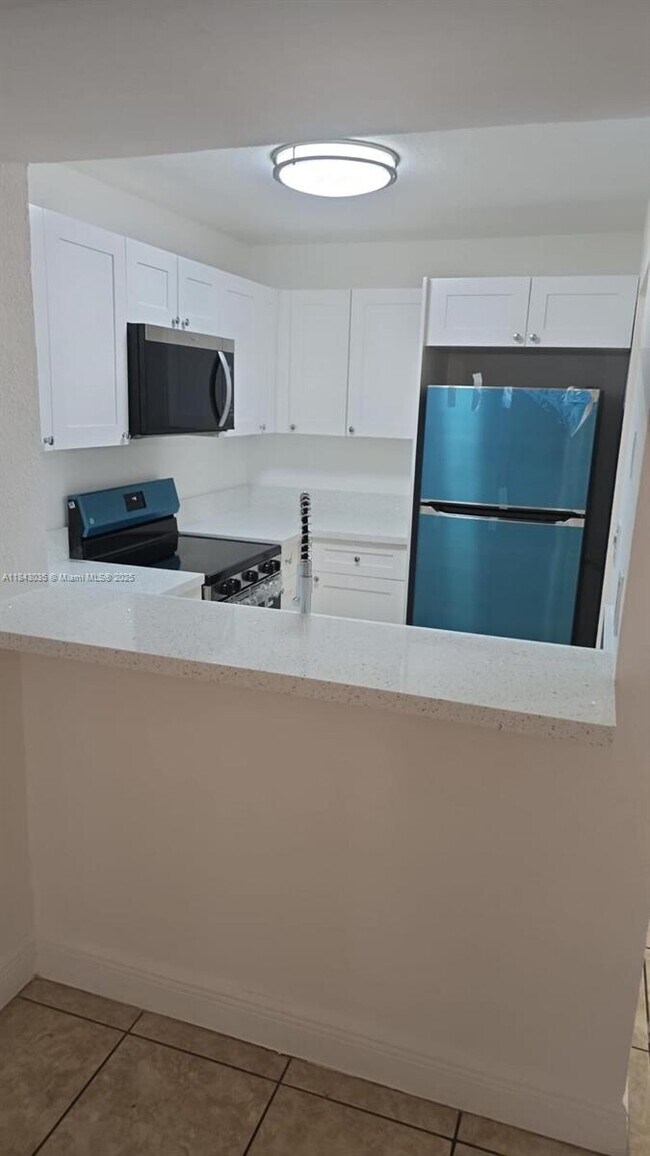 Building Photo - 1095 W 77th St
