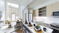 This two-story, 2-bedroom, 2-bathroom residence offers a thoughtfully designed open-concept layout that seamlessly connects the kitchen, dining, and living areas. Soaring double-height ceilings and expansive floor-to-ceiling windows flood the main living space with an abundance of natural light, creating an airy and inviting atmosphere. The modern kitchen is outfitted with sleek flat-front cabinetry in warm neutral tones, stainless steel appliances including a full-size refrigerator, a undermount sink with a contemporary faucet, and open shelving for stylish display storage. A generous waterfall-edge island with seating serves as both a casual dining and entertaining hub. The living area flows naturally from the kitchen, offering a comfortable, well-lit space with views to the outside. Warm hardwood flooring runs throughout the main level, complementing the clean white walls and modern pendant lighting. The overall ambiance is bright, sophisticated, and functional, with contemporary design choices that balance form and utility. Spread across two floors, the layout provides separation between living and private spaces, making it well-suited for both everyday living and hosting guests.