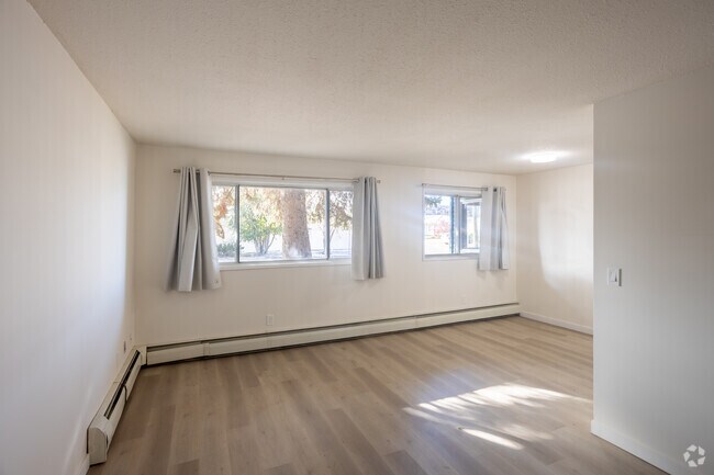 2 chambres, 2 salles de bain - 90 m² - Salon/Salle à manger - Mainstreet Red Deer Apartments