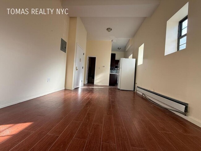 Photo - 712 E 214th St Apartment