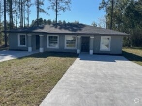 Building Photo - 9355 N Travis Dr