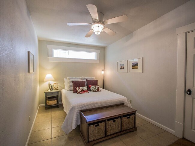 Bedroom #1. Downstairs with queen bed. - 514 Deep Eddy Ave