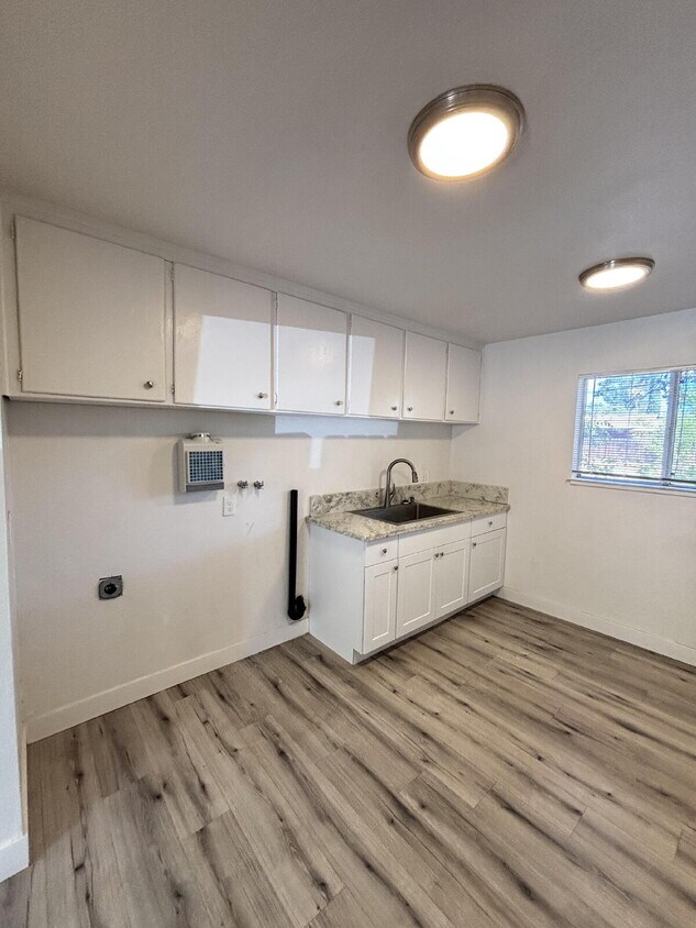Foto del edificio - Great updated cottage in gated community with Bonus Room!