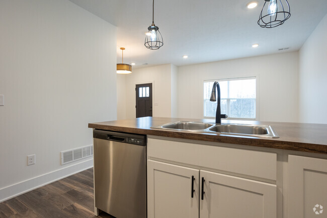 3 BR, 2.5 BA - 1498 pies cuadrados - The Vue at Rivertown Park Townhomes