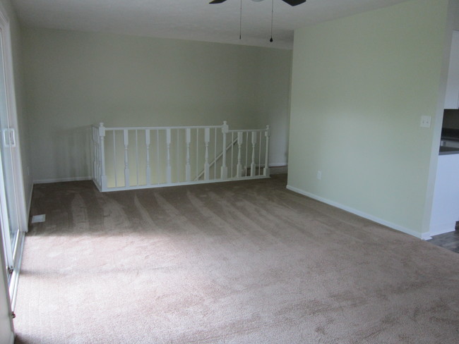 Living room looking towards stairway - 150 N Mechanic St