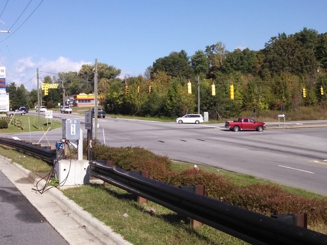Traffic light at entrance to property - 1105 Main St