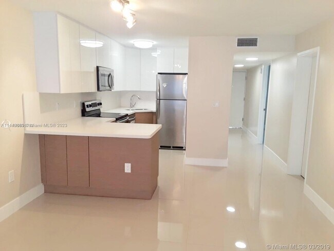 Building Photo - 10230 Collins Ave