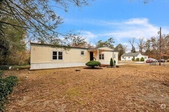 Building Photo - 7601 Magnolia Dr
