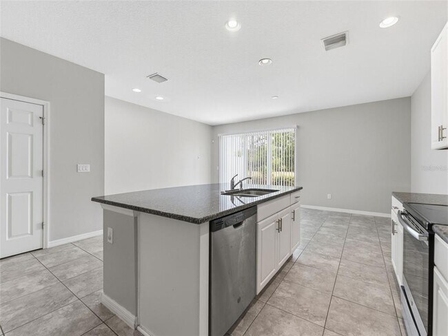 Foto del edificio - 7052 Grand Elm Dr