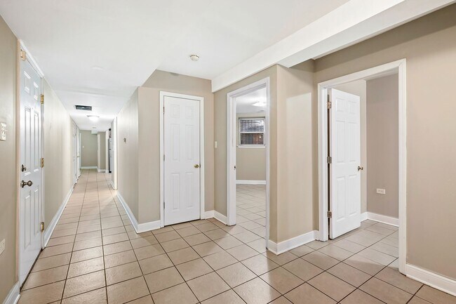 Building Photo - 4851 S Prairie Ave | Jim Sears