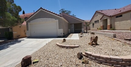 Building Photo - 8909 W Colorful Pines Ave
