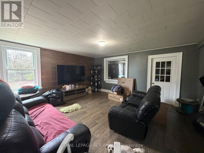 Photo du bâtiment - 174095 County Rd 25