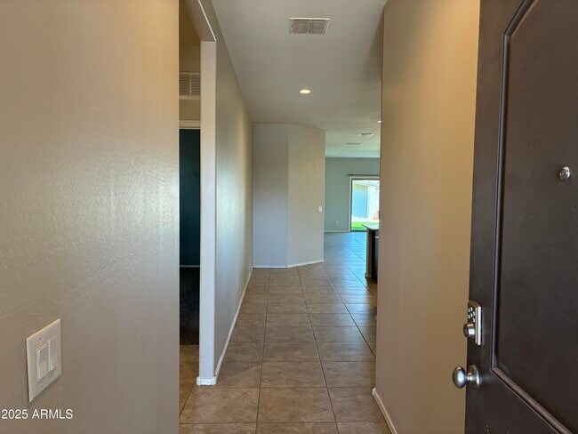 Building Photo - 25698 W Desert Dr
