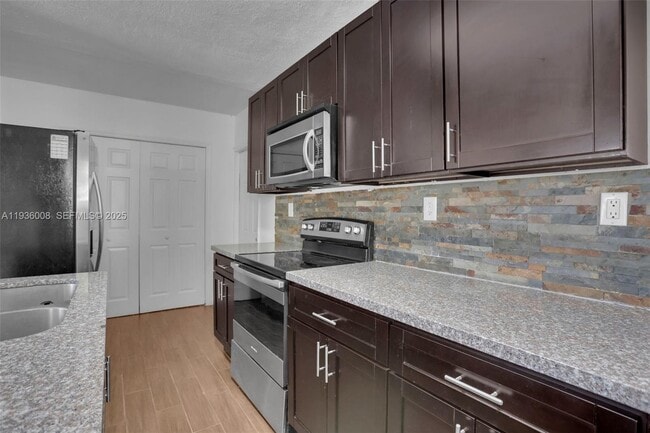 Building Photo - 510 N 69th Ave