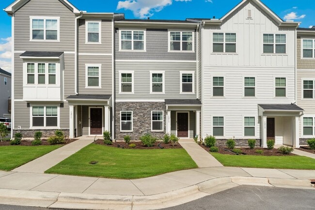 Building Photo - LOCATION!! Modern Townhome in Sought-After...