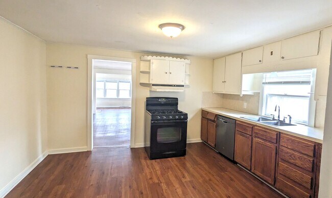 Building Photo - 1343 E. Broadway. House with basement and ...