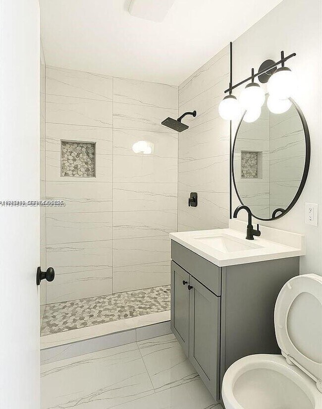 Foto del edificio - 1400 NE 43rd Ct