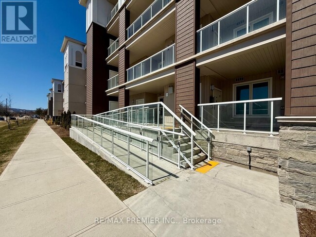 Photo du bâtiment - 5-415 Spooner Cres
